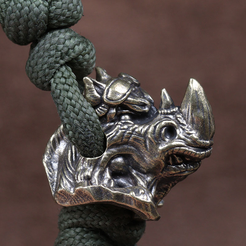 Rhinoceros Head Brass Knife Be - Paracord Survival Bracelet recension och pris