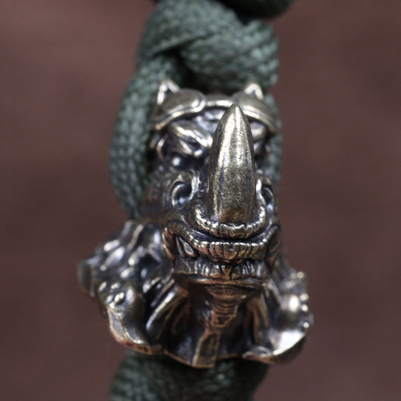 Rhinoceros Head Brass Knife Be - Paracord Survival Bracelet recension och pris