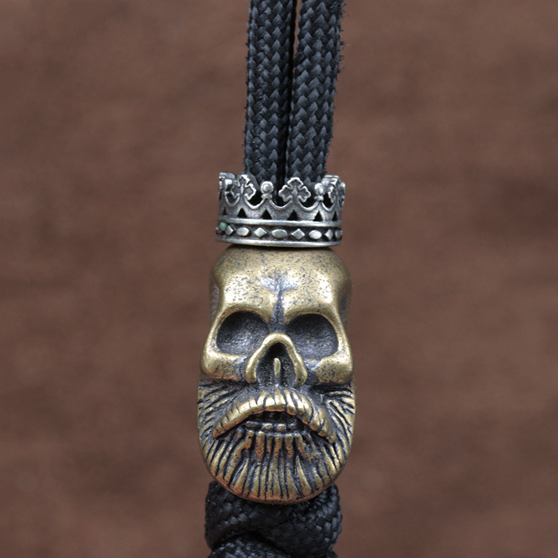 Big Hole Royal Crown Brass Kni - Paracord Survival Bracelet recension och pris