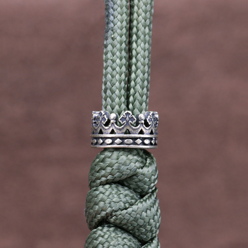 Big Hole Royal Crown Brass Kni - Paracord Survival Bracelet recension och pris