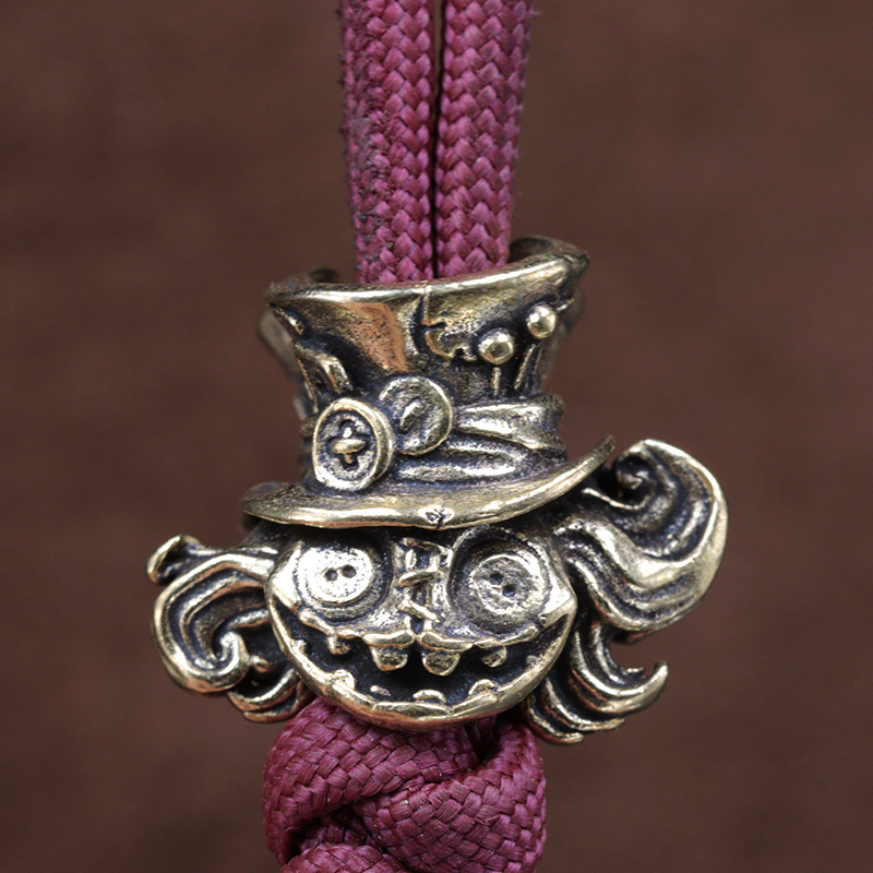 Double-sided Puppet Head Brass - Paracord Survival Bracelet recension och pris